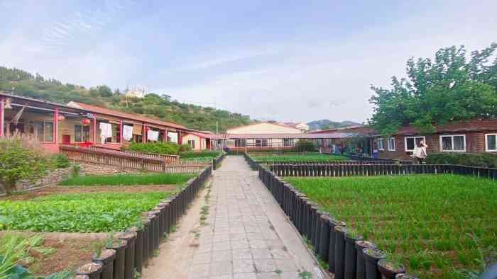 明秀园山庄-"明秀园山庄位于崂山樱桃之乡北宅周哥庄
