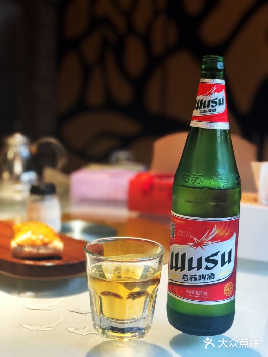 品质伊骊新疆菜(紫金店)新疆乌苏啤酒图片