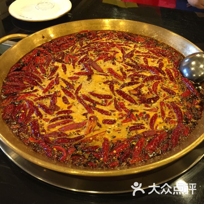 重庆壹圣元火锅(安定门店)翻滚的红油锅底图片 - 第640张