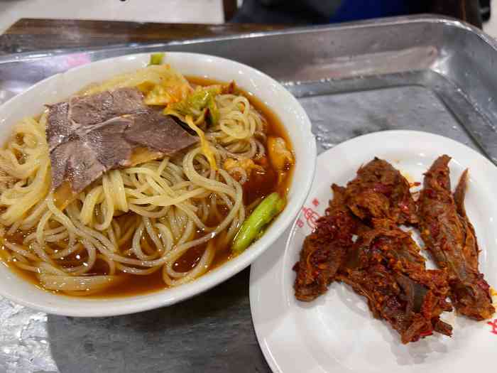 西塔大冷面(市府大路店"沈阳所有的冷面店,狗肉全是发霉变质的死狗.