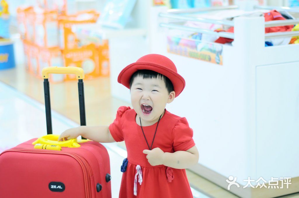 汪正影业韩童国际儿童摄影私家会馆-招牌笑图