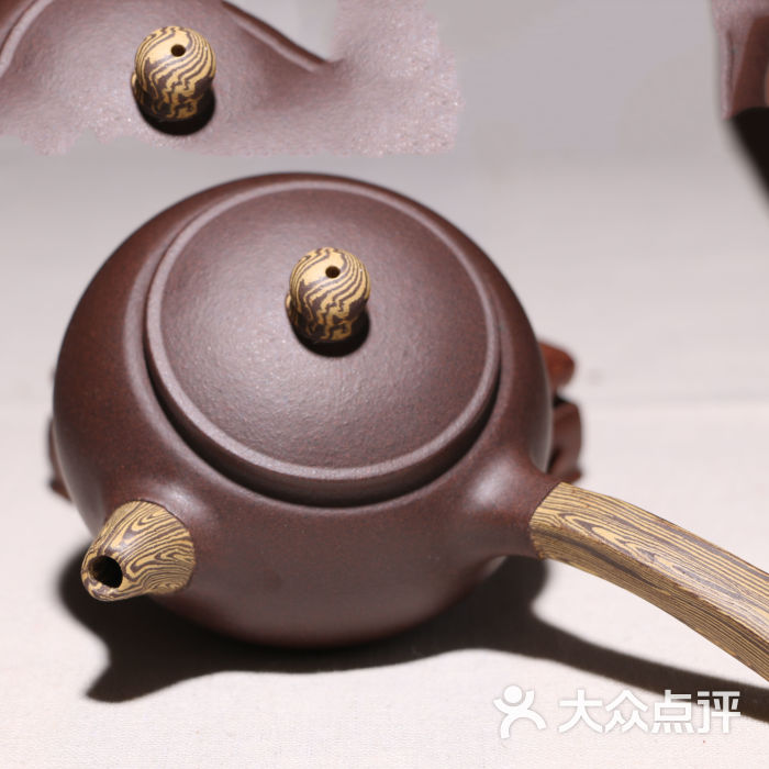 侧把紫砂壶