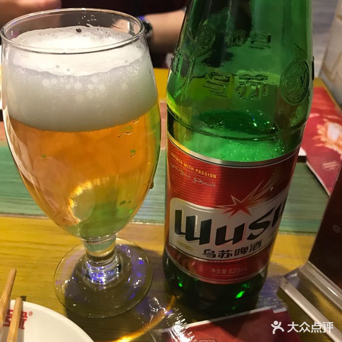 回乡缘西域餐厅(三号湾广场店)乌苏啤酒图片