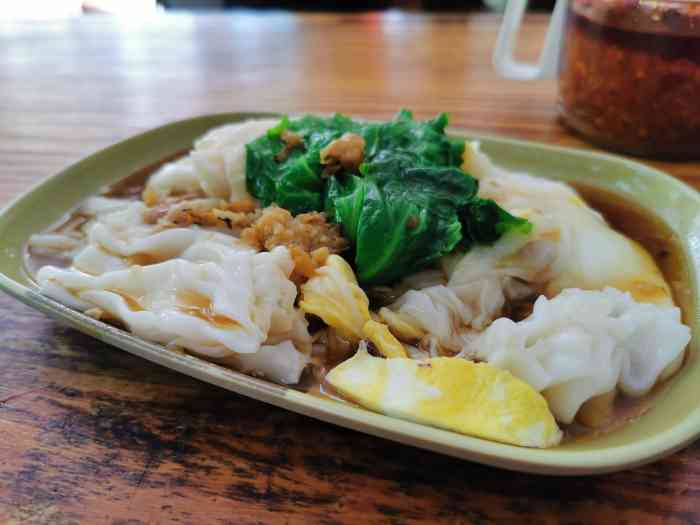 化州香油鸡饭 石磨肠粉"这家店早餐蛋肉肠很好吃,料很足,不过这次.