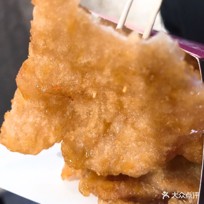 在南站火车站一楼附近的万达大调地下天津。美食查广场图片