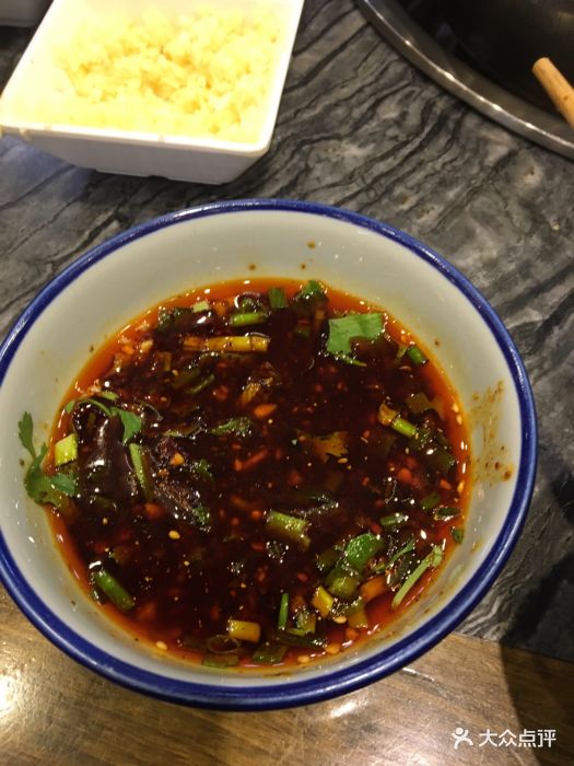 泸州酸菜豆花(红瓦寺店)秘制油碟图片