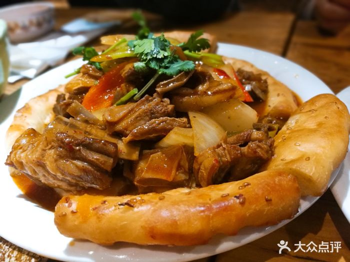 天山明珠·新疆餐饮名店(世贸店)馕包肉图片