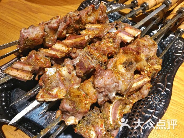 古丽娜依新疆主题餐厅(利津路店)烤羊排图片 - 第1247张