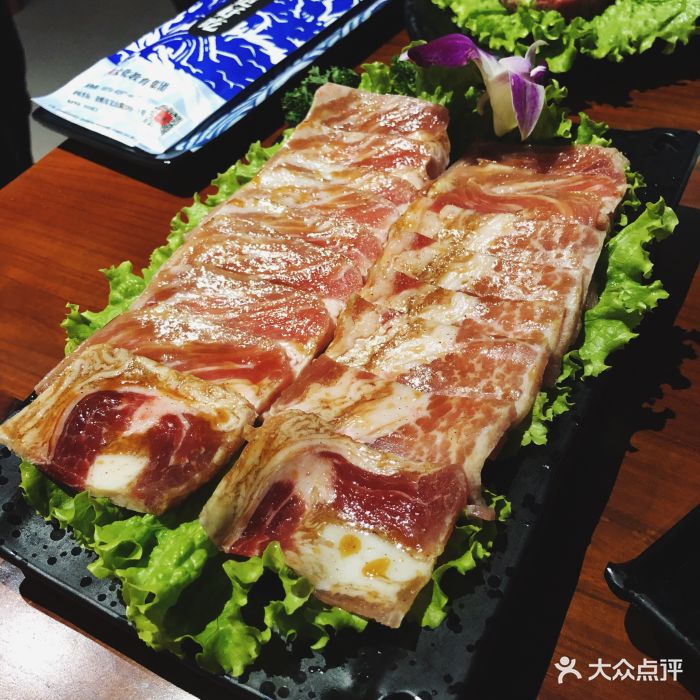 大浪炭火鲜牛肉·酒场(欧洲城店)调味五花肉图片