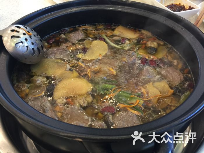 澳盟清汤黄牛肉(文星分店)下了牛肉的汤锅图片 第3张