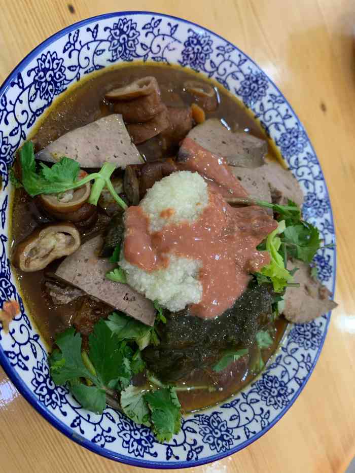 原肖村桥卤煮(清逸园店"卤煮,做为北京传统地方小吃,从最初清代光.