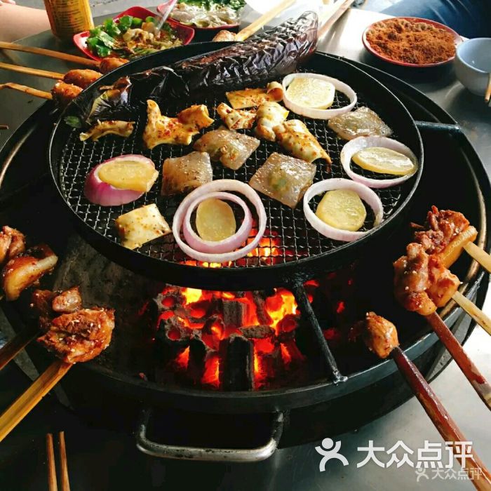 彝人部落原始风味火盆烧烤图片 - 第6张