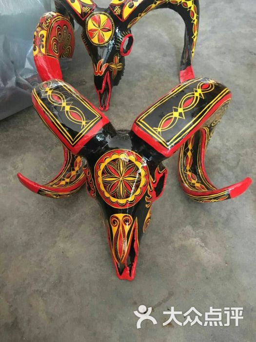 彝族羊头漆器