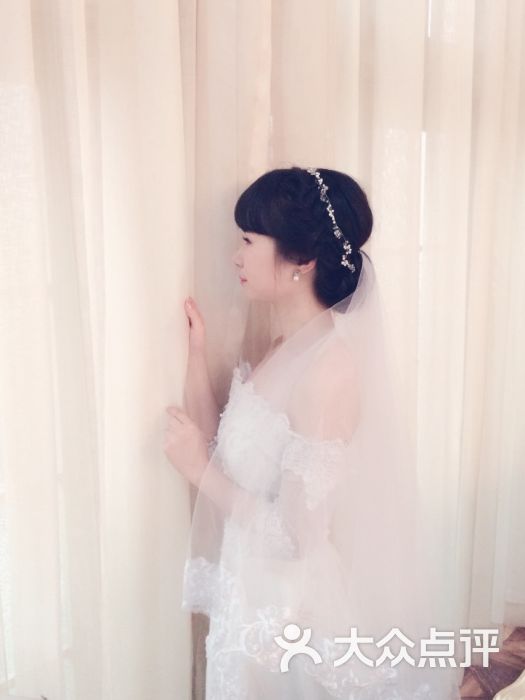 乐玛婚纱摄影_玛奇玛图片(2)