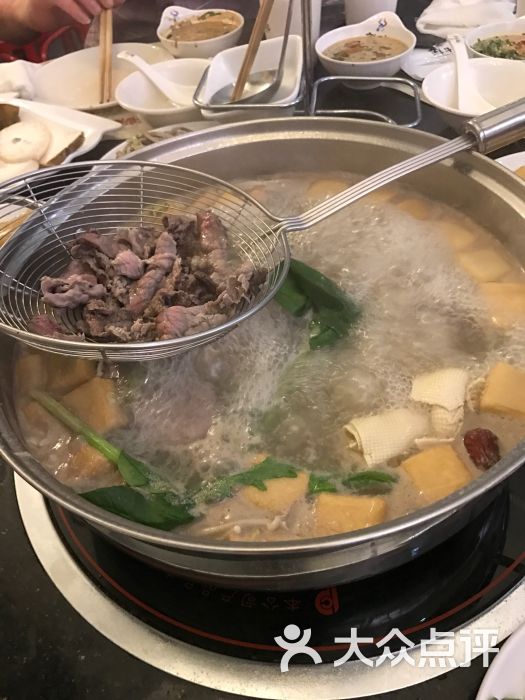 鲜牛记潮汕牛肉火锅(望京店)清汤锅底图片 - 第1张