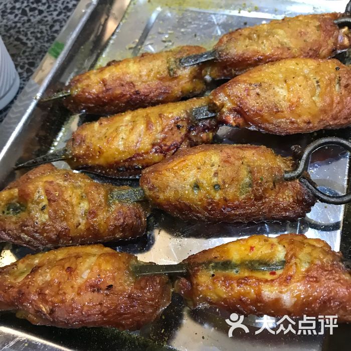 大漠馕坑肉烤鸡翅图片 - 第1张