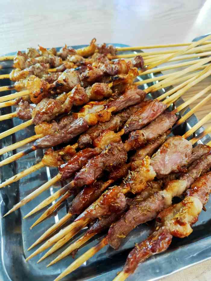 杨肉串"羊肉串是近几年来流行很广的大众饮食,基本-大众点评移动版