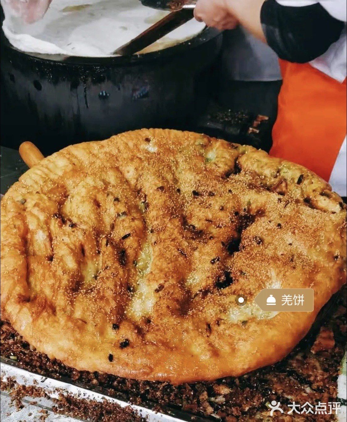 来上海怎么能不吃一口潘记羌饼的羌饼,油煎饼呢?