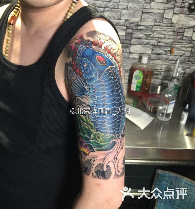 祥tattoo专业纹身馆包大臂外侧鱼图片 - 第12张
