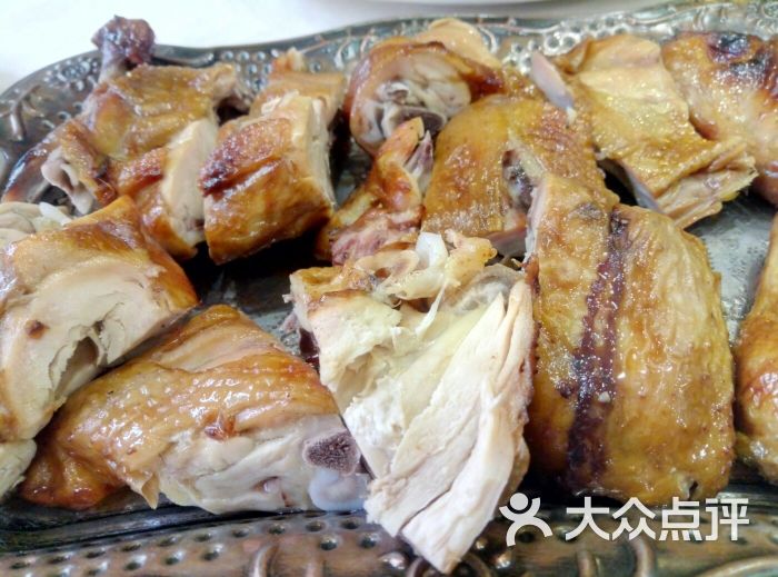 大漠楼兰新疆美食(牡丹园店)馕坑烤鸡图片 - 第3张