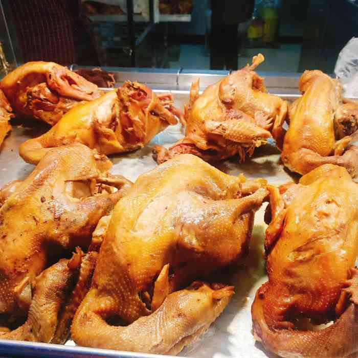广鑫斋卤鸡店"这家广鑫斋 我记得以前就叫老杨家 也有超.