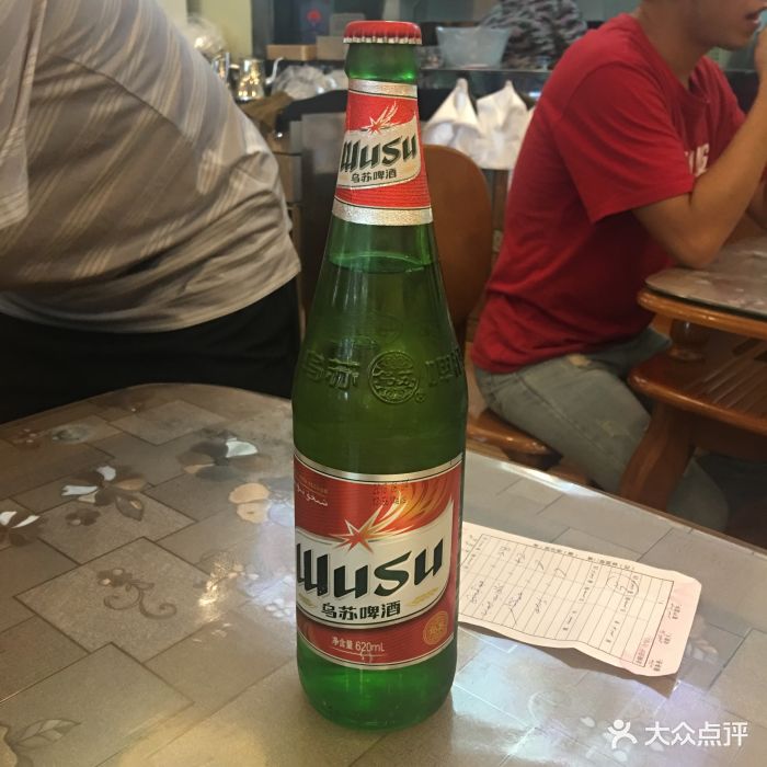 热西塔大盘鸡店乌苏啤酒图片