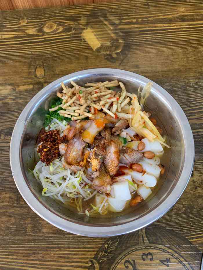 回味金城-"喜欢这一家清新的河池煮粉早高峰和午餐时.