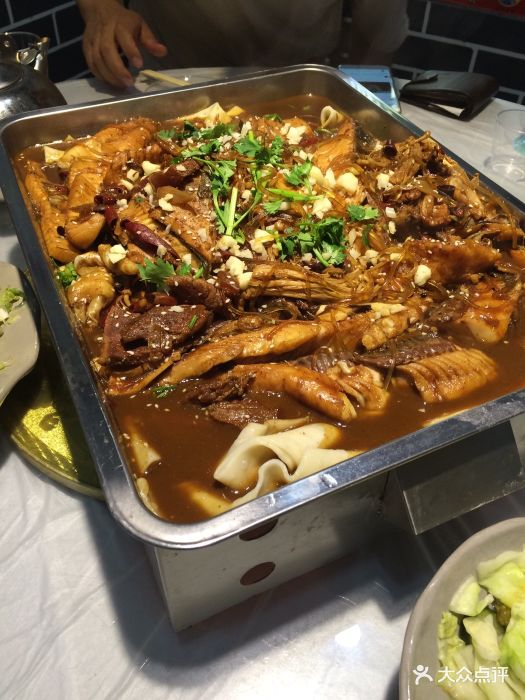 王婆炒鱼图片