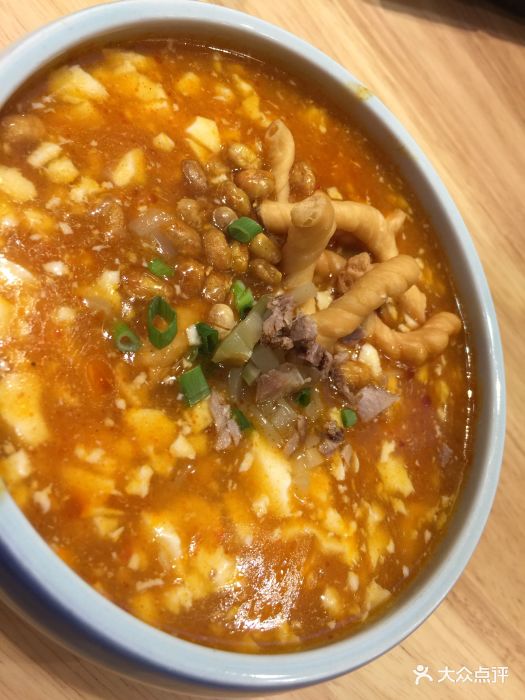 小六汤包酸辣豆花图片