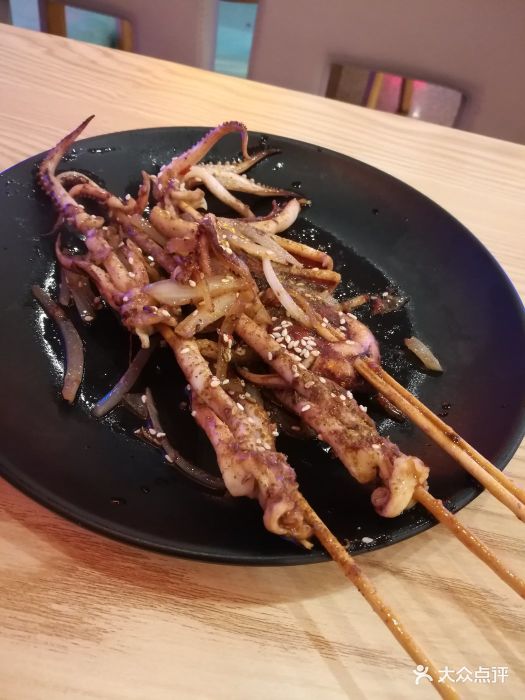 东郊椰林平价海鲜舫(大东海店)烤鱿鱼图片 - 第1张