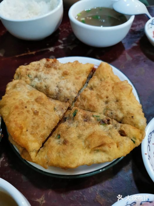 冯四孃跷脚牛肉·非物质文化遗产店红糖饼图片