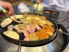 -彝人部落火盆烧烤(原内环足球场店)