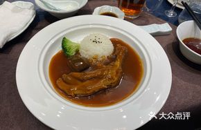 Braised Goose Feet with Abalone Sauce over Rice