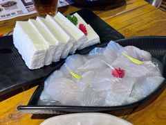 -老牌坊云南鱼豆花火锅(哈西万达店)