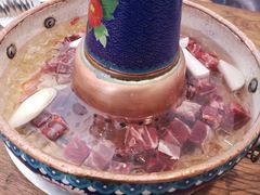 -毛辣果·贵州红酸汤牛肉火锅(西单店)