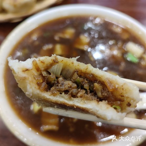 宛伊品烤烧炖锅炝锅面