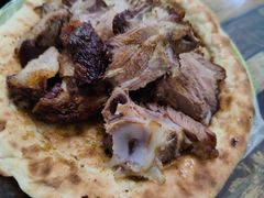 烤羊腿-艾力江和田馕坑烤肉店
