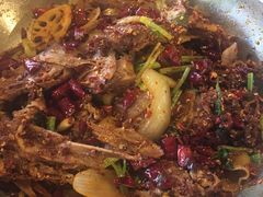 爆辣干锅鸭头-安诚居干锅鸭头(八角店)