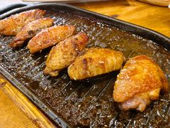 料理烤焦香翅中-老东镇啤酒屋海鲜加工·蒸汽海鲜·海鲜烧烤(台东店)