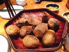 烤洋芋-帅巴人舅母子腊蹄民俗村