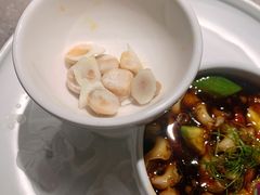 辣酒汁花螺配夏威夷果-木守西溪溪隐餐厅