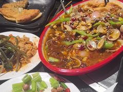 -明何记涮牛肚(品牌首店隋唐植物园南门古城路店)