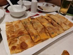 鸡蛋葱花飞饼-大铁勺新津菜(东丽阳光新业广场店)