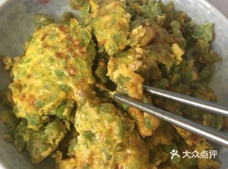 今天来一个清热解毒，开胃，又有营养的时令菜—苦瓜展蛋