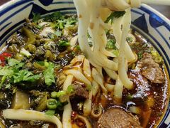 老坛酸菜牛肉面-老九圆山西面馆(CBD店)