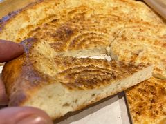 馕坑芝麻馕-巴扎美食·新疆菜·西域歌舞表演餐厅(新疆大厦店)