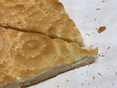 馕坑芝麻馕-巴扎美食·新疆菜·西域歌舞表演餐厅(新疆大厦店)