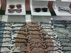 -GOOMI久米眼镜·蔡司·依视路·明月官方授权店(龙德紫金店)