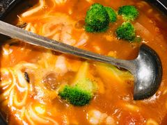 番茄汤牛肉剪刀面-九毛九西北菜(大东海店)