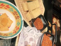 -老牌坊云南鱼豆花火锅(哈西万达店)